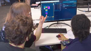 Group of university students learning how to work with virtual production software Pixotope