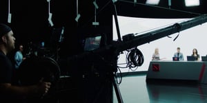 Camera operator adjusting camera while working on Dota 2 International