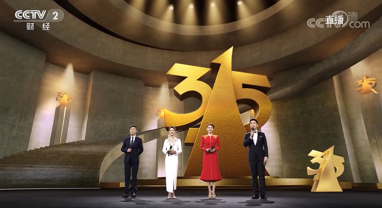 4 hosts standing in front of large LED volumes 4 hosts standing in front of large LED volumes